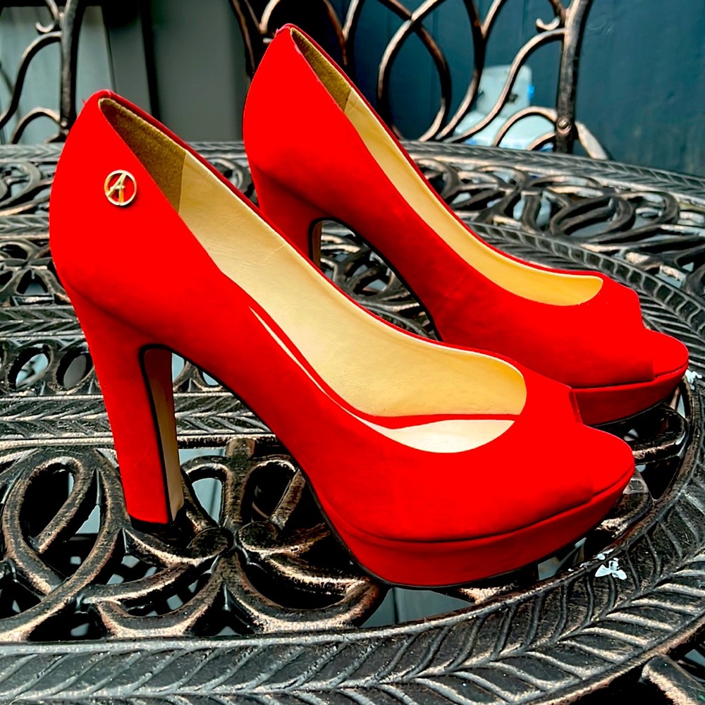 Red peep toe pumps